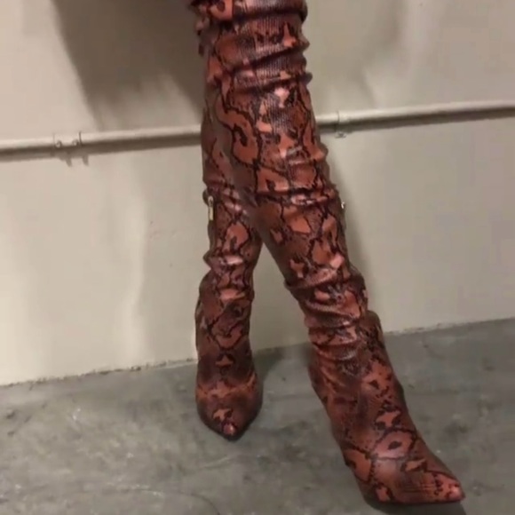 kloset envy Shoes - kloset envy Thigh high rust snake boots. Sold out. Never worn size 7.5